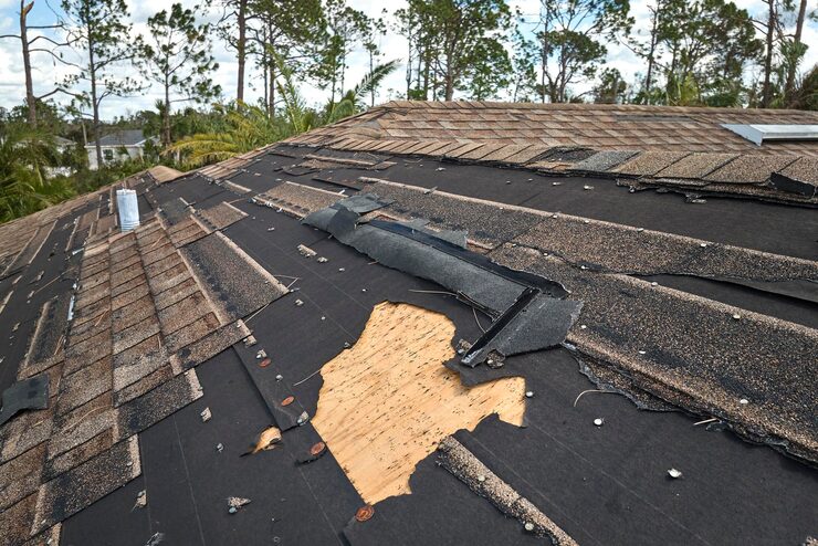 damaged-house-roof-with-missing-shingles-after-hurricane-ian-florida-consequences-natural-disaster_127089-26882 damaged-house-roof-with-missing-shingles-after-hurricane-ian-florida-consequences-natural-disaster_127089-26882